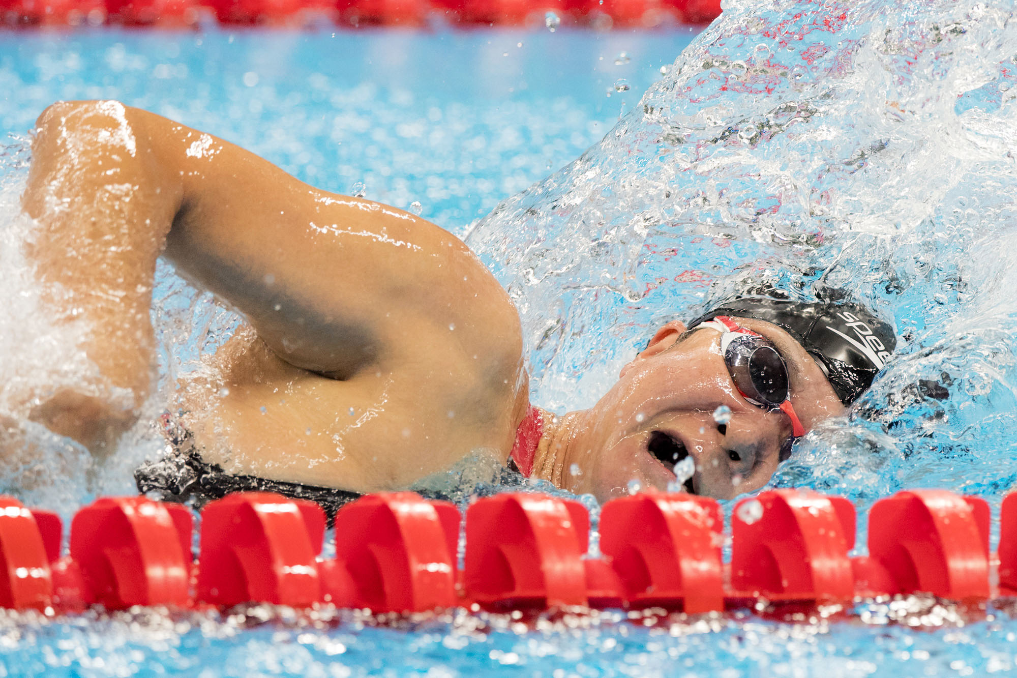 50m自由形予選で日本新記録を更新し、決勝進出した成田真由美の予選の泳ぎ（撮影：越智貴雄）